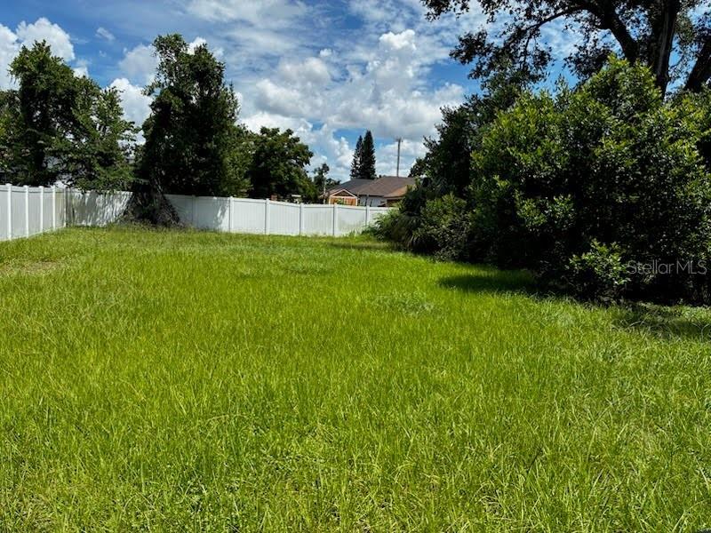 Situated in a convenient and growing area, this property offers an excellent opportunity for development or investment. The lot is fully enclosed with fencing, providing security, privacy, and clear boundaries. With close proximity to major roads, downtown Tampa, Ybor City, and local amenities, this site is perfect for building your dream home. Don’t miss the chance to own a well-located, ready-to-develop parcel in one of Tampa’s vibrant neighborhoods.