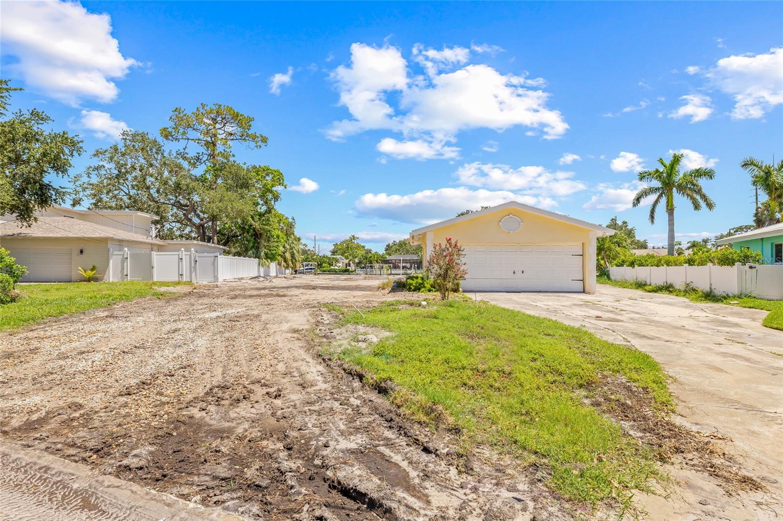 Don’t miss this rare opportunity to own a ready-to-build oversized waterfront lot in St. Petersburg. Located at 5165 Dover Street NE, this expansive 102x152 ft property (approximately 16,152 sq ft) sits directly on a canal with boating access to Tampa Bay and beyond. Just 10 minutes from vibrant downtown St. Pete, this location offers the perfect balance of peaceful waterfront living and city convenience. The lot has already been cleared—saving you time and money—and includes a standing storage garage for use during construction. This property offers the space and setting to bring your vision of waterfront living to life. Priced to sell—secure your piece of waterfront paradise today.