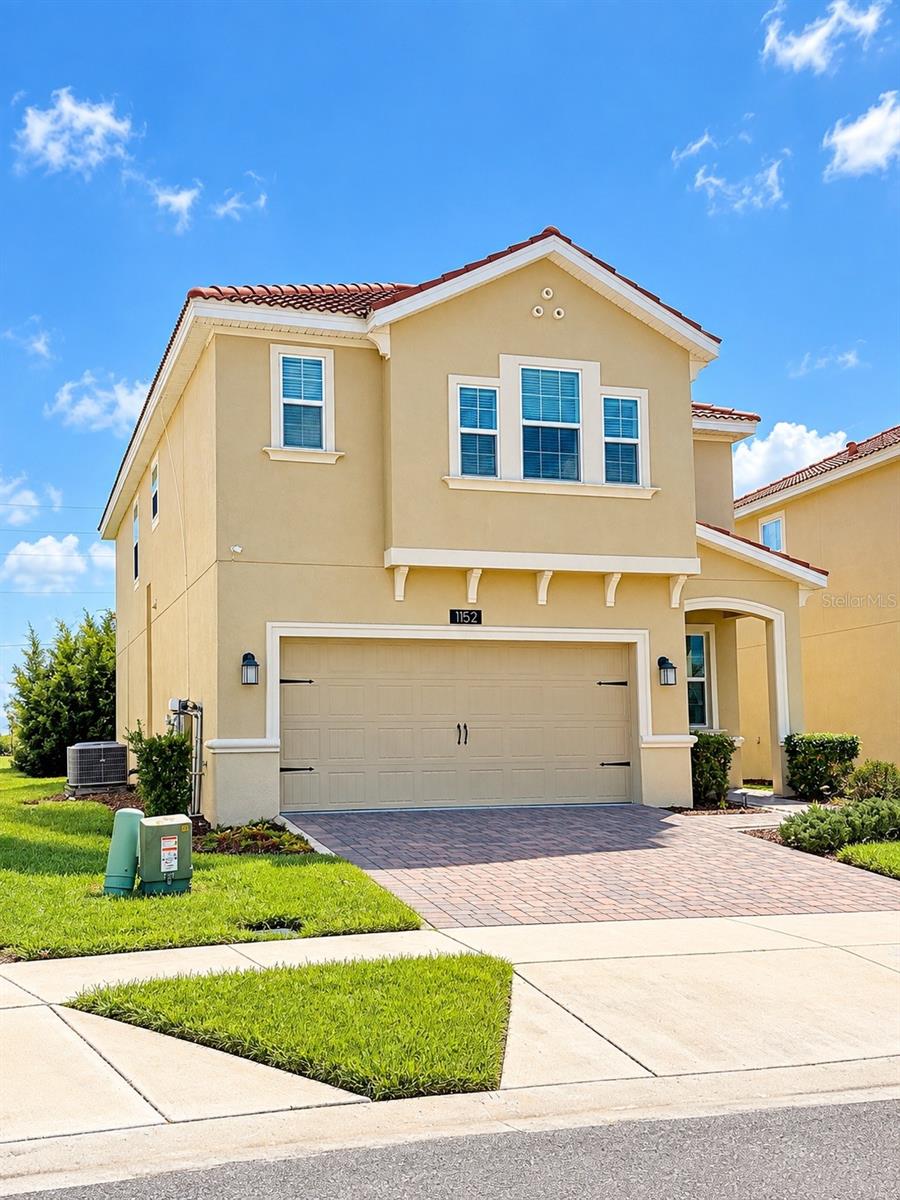 Photo of 1152 Trappers Trail Loop, Davenport, FL 33896 (MLS # O6443752)