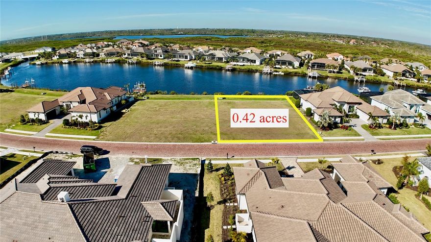 This property is APPROVED FOR A BOAT DOCK AND LIFT. This community is Flood Zone X, which was not flooded during Hurricanes Helene and Milton. This BOATING COMMUNITY is consistently rated #1. Build your dream home and enjoy daily waterfront views, hop on your boat from your backyard, or go for a round of GOLF. You can do it all! The GULF OF MEXICO is only a 35-minute boat ride away. This property is conveniently located and allows for a 10-minute drive to Lakewood Ranch, a 20-minute drive to Sarasota, a 30-minute drive to St. Pete, or a 40-minute drive to Tampa. The dock is deeded and can be built with your home. GOLF membership is available through The River Wilderness Golf & Country Club. The Club at River Wilderness is a semi-private Golf & Country Club located on Florida’s Suncoast in the Manatee-Sarasota County area. The Club features an 18-hole championship golf course, a fully equipped athletic center, tennis courts, pickleball courts, a Junior Olympic-size swimming pool, and a grand clubhouse featuring extraordinary dining and banquet and catering facilities. The Club is located inside the gates of River Wilderness, a gorgeous golf community. *All information is deemed reliable. Buyer or buyer agent responsible for due diligence to confirm all information.*