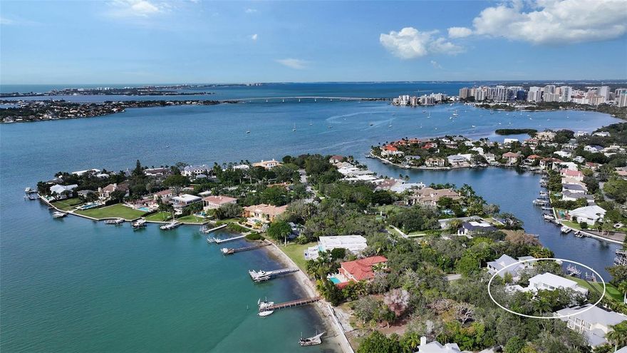 PRICE IMPROVEMENT.  Imagine living in a gorgeous, brand new waterfront home on one of Sarasota's most desirable streets...Presenting another stunning design by Coastal Luxury Homes. This magnificent contemporary has water views from almost every room. With its open floor plan and high end finishes you will have an amazing home to live and entertain in. Located on the western portion of Hillview Drive in exclusive Harbor Acres, this half-acre lot offers privacy, and water access.  Your luxurious kitchen with European designer cabinetry, extra large quartz waterfall island, lot’s of counter space, Sub Zero and Wolf appliances, and a large walk-in pantry is designed for the most discriminating home owner. Enjoy indoor-outdoor living in the Great Room that opens to a large, covered lanai with outdoor kitchen. The wet bar is convenient to both the kitchen, living areas, and study. The first-floor owner's suite offers a true refuge for rest and relaxation. Access the second floor by stairs or elevator where you will find three generously sized bedrooms with ensuite baths opening to a wrap-around deck looking out to the bay, pool area below and the downtown skyline. Highlighted by an infinity edge pool with spa and mature landscaping, this oasis provides ample space for your outdoor entertaining. Boating enthusiasts will appreciate quick bay access with no fixed bridges. All built to the highest level of construction quality in collaboration with Jonas Yoder Custom Homes.  Dream it, live  it, move in now.