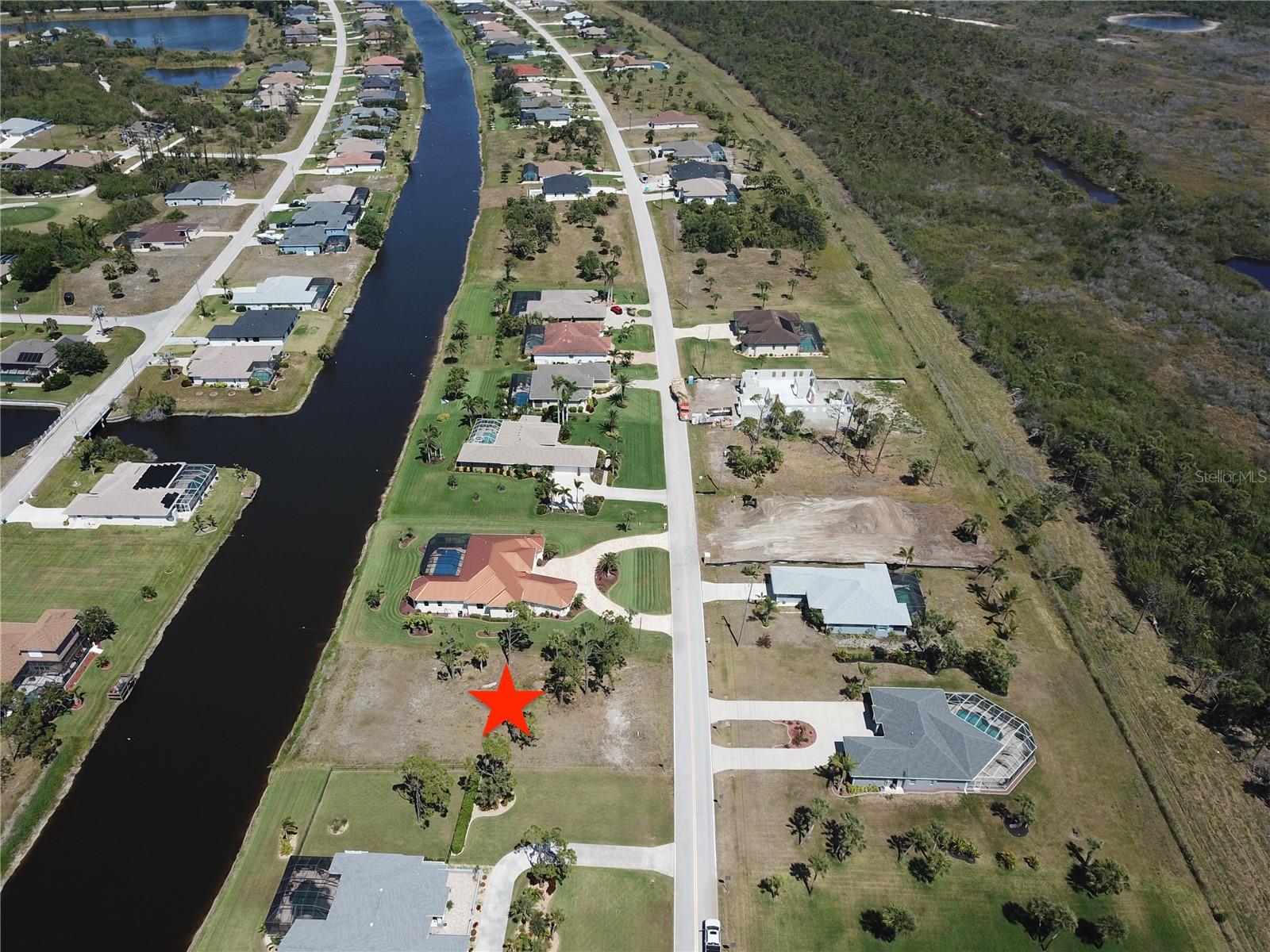This mostly cleared OVERSIZED WATERFRONT lot offers the perfect spot to build your Florida dream home! Located on a peaceful canal, the lot is 92 feet wide—wider than most in the area, giving you plenty of space and privacy.
Enjoy stunning water and wildlife views from your future pool or lanai. The neighboring homes are on larger lots with wide setbacks, providing more space between properties.
Public water and sewer are available.
Rotonda West is a beautifully maintained, deed-restricted community with a low annual HOA fee and a wide variety of recreational activities for every lifestyle. Whether you love golfing, boating, fishing, hiking, tennis, biking, or pickleball, there’s something for everyone to enjoy. Just a short drive away, catch a game at Charlotte Sports Park, stroll through the unique shops of Olde Englewood Village, or soak up the sun on the Gulf beaches of Manasota Key and Boca Grande. Don’t miss your chance to build your personal oasis in one of Southwest Florida’s most sought-after communities.