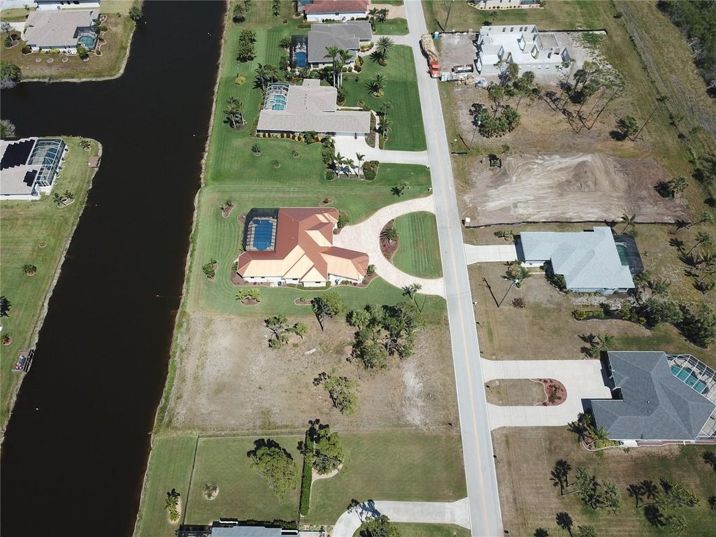 Photo of 1190 Boundary Boulevard, Rotonda West, FL 33947 (MLS # C7508590)