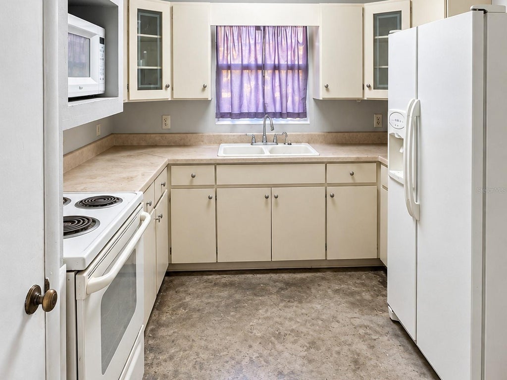 Photo of 540 Sharon Circle, Port Charlotte, FL 33952 (MLS # A4708243)