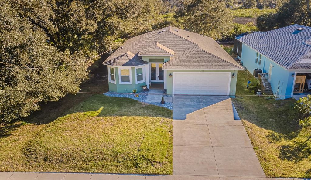 Photo of 12508 Glenna Avenue, Tampa, FL 33635 (MLS # TB8465813)