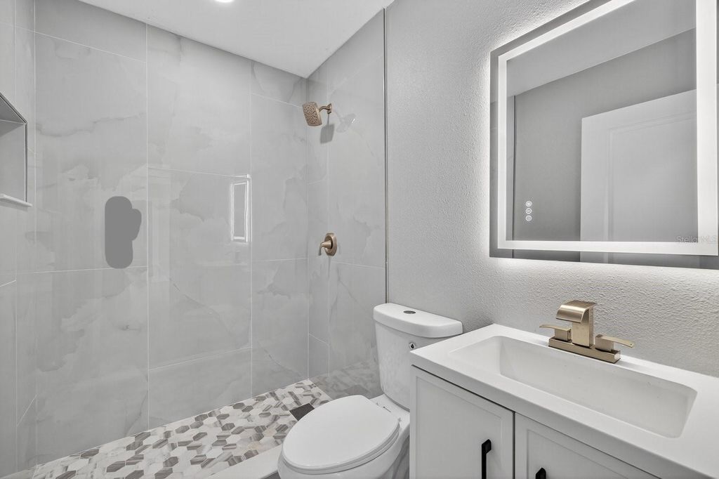 Photo of 4009 W Wallace Avenue, Tampa, FL 33611 (MLS # TB8435351)