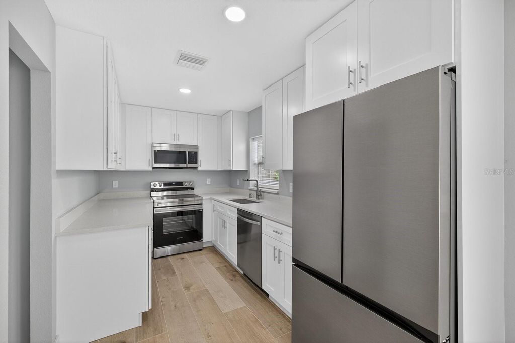 Photo of 4009 W Wallace Avenue, Tampa, FL 33611 (MLS # TB8435351)