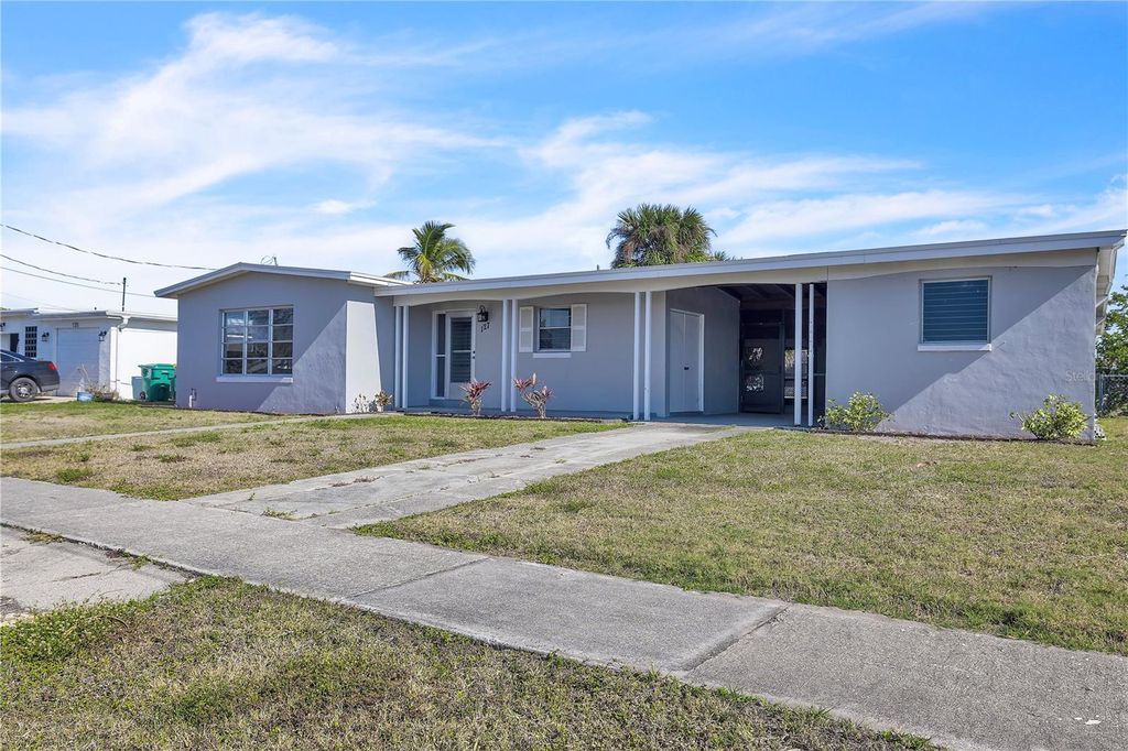 Photo of 127 Godfrey Avenue NE, Port Charlotte, FL 33952 (MLS # C7521457)