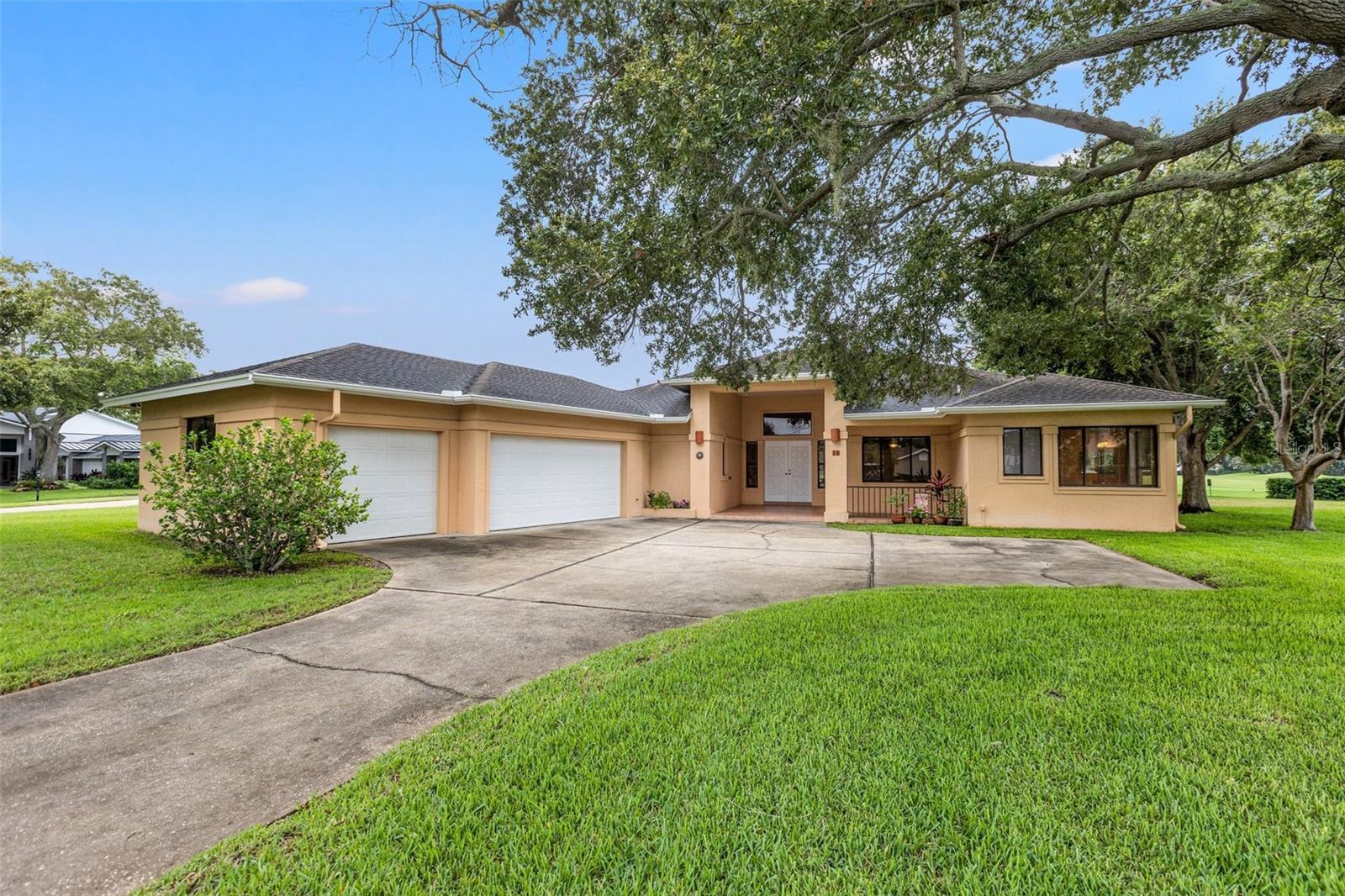 Indulge in the epitome of luxury living with breathtaking views overlooking the lush fairways of the renowned Pelican Golf Club, a distinguished host of LPGA tournaments. This exceptional home is located on the largest lot of this quiet cul-de-sac, designed for comfortable living, family gatherings, and entertaining on Pinellas County's premier private golf course. Â Step inside and discover a thoughtfully designed floor plan that maximizes privacy and functionality. The split-style layout features three generously sized bedrooms, ensuring ample space and privacy for all. The master bedroom is a true retreat, boasting a bathroom with dual sinks, a walk-in shower, and his and her closets. Â The heart of the home is the magnificent great room, adorned with a beautiful fireplace, soaring 12-foot high ceilings and golf course views. This central gathering point provides a perfect setting for memorable moments with loved ones. The kitchen is a chef's dream, showcasing upgrades such as granite counters, stainless appliances, 180 degree views and an abundance of natural light. Â Step outside and find that the covered and screened patio is an ideal spot for al fresco dining, where you can savor your meals or enjoy a cool beverage in this uniquely private backyard setting. Â Car enthusiasts can enjoy an oversized three-car garage as well as plenty of parking space available in the driveway. Â Embrace the prestigious lifestyle offered by this exceptional home, where stunning golf course views and thoughtful design seamlessly blend to create an extraordinary living experience.
