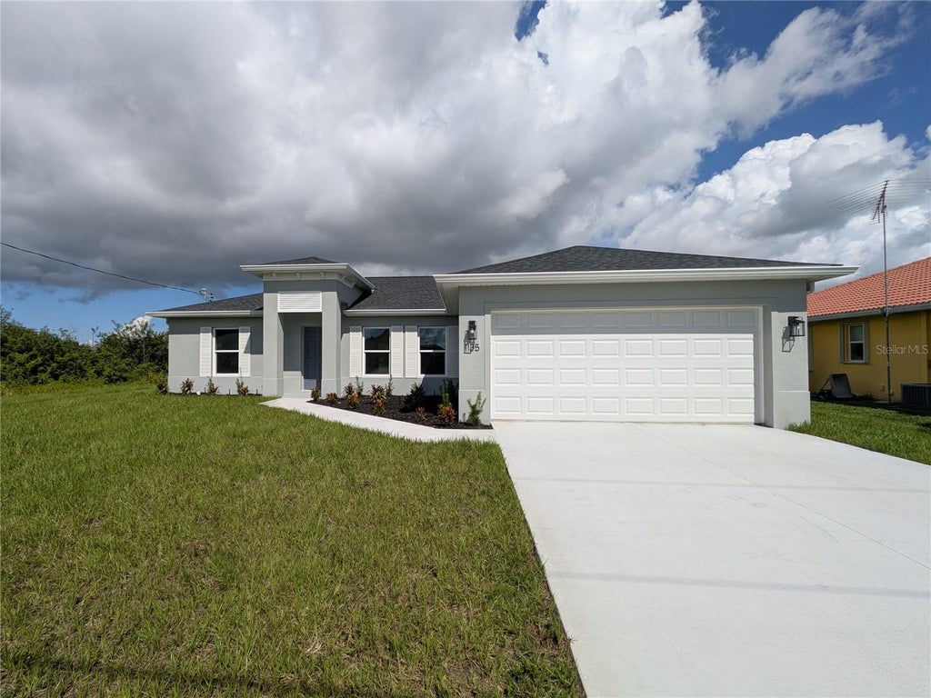Photo of 1135 N San Mateo Drive, North Port, FL 34288 (MLS # C7530283)