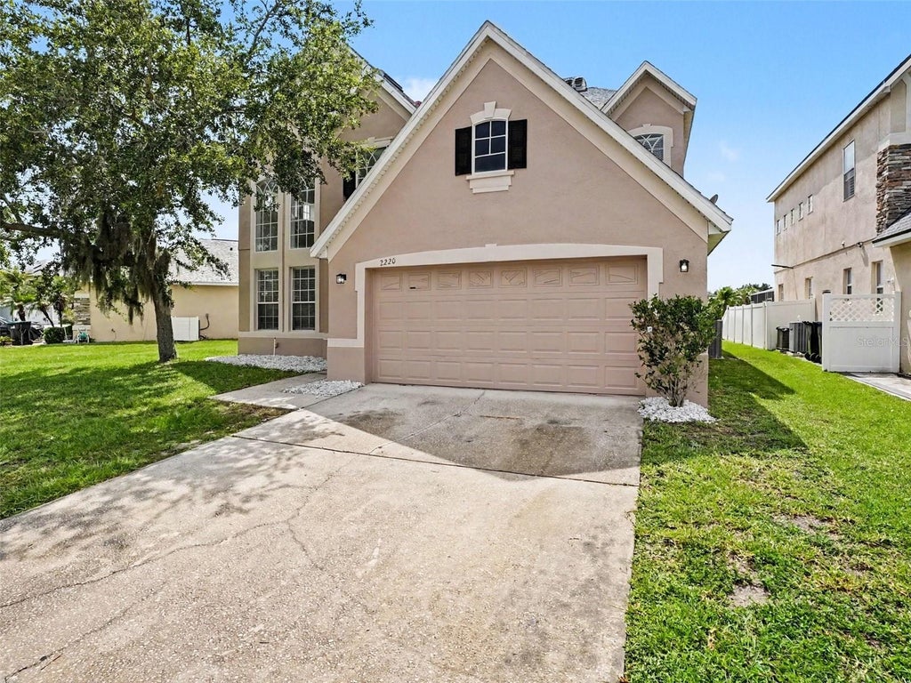Photo of 2220 Sand Arbor Circle, Orlando, FL 32824 (MLS # O6410104)
