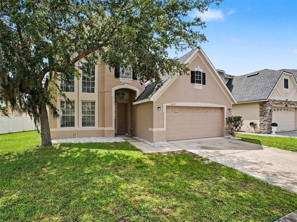 Photo of 2220 Sand Arbor Circle, Orlando, FL 32824 (MLS # O6410104)