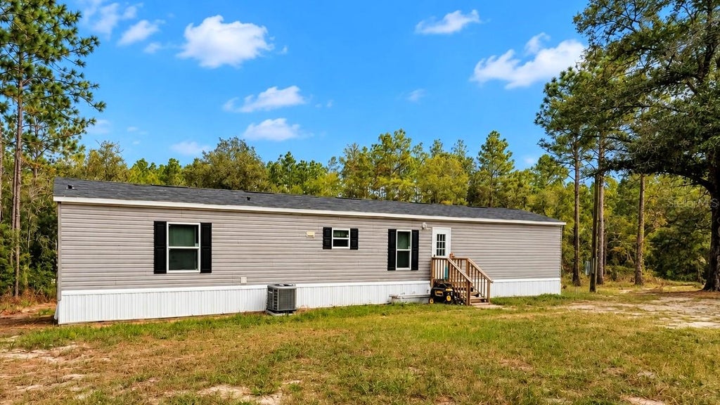 Photo of 6038 NW 17th Court, Bell, FL 32619 (MLS # GC543967)