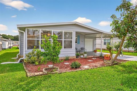 Photo of 710 Carriage Lane, Leesburg, FL 34748 (MLS # G5103192)