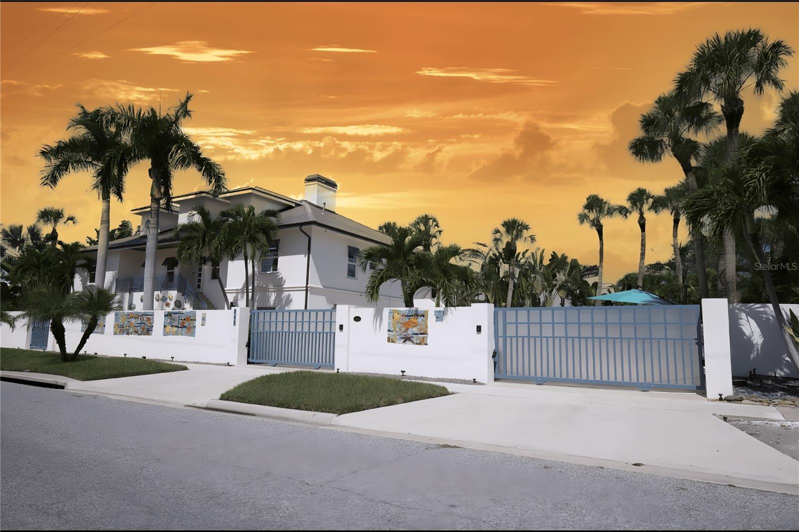 Welcome to The Urban Oasis, a modern, contemporary style compound that combines the breezy, open vibe of Key West design with density and energy of a metropolitan area. This meticulously maintained, peaceful retreat has the vibes of a private, self-contained estate but still just steps away from the city's hustle. Truly a pinnacle of urban living and custom design that offers a premium, highly desirable lifestyle. This completely renovated, turnkey home is pristine, and every detail has been thoughtfully curated, from the impeccable finishes to the custom accents. With sparing no expense, this property comes boasting with two full levels of luxury upgrades that features hurricane impact windows and doors, travertine decking surrounding the entire property, a 6 foot privacy wall with electronic gates, a state-of-the-art security system that includes surveillance and alarming from any mobile device, wood and marble flooring, high end appliances such as Wolf, Subzero, and Fisher & Paykel, premium skylights for enhanced natural lighting, newer A/C systems with specific zones, designer zeroscaping, brand new copper gutters and downspouts, completely remodeled bathrooms with floor to ceiling tile, a massive 1,800 square foot separate living space that can be used for anything thinkable and containing its own private entrance, an 80 foot screened and covered lanai on each level, newly renovated pool with water features, and frankly, the list just goes on and on. Stepping onto this property isn’t just something you did once, it’s memorable experience that will set the bar for your expectations going forward. Having the prime location of literally being 15 steps away from the highly sought after and historic St. Armands Circle, you simply cannot find the best of both world like you can here. Come make your dream a reality and schedule your private showing today.