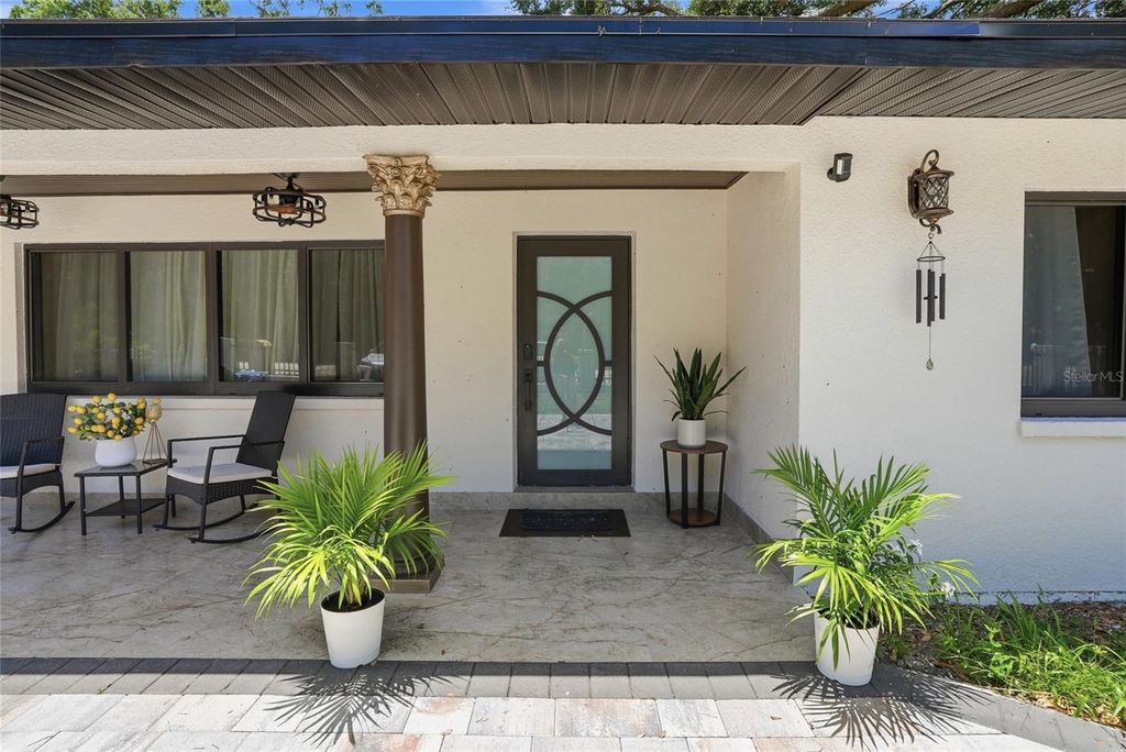 Photo of 15040 Lake Magdalene Boulevard, Tampa, FL 33618 (MLS # TB8511321)