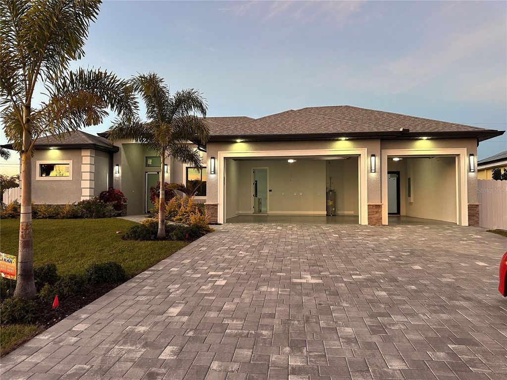 Photo of 419 NW 4th Terrace, Cape Coral, FL 33993 (MLS # A4666895)