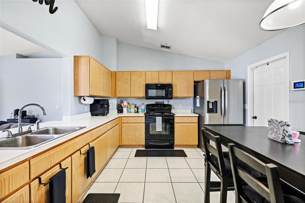 Photo of 145 Eagle Point Boulevard, Auburndale, FL 33823 (MLS # O6380028)