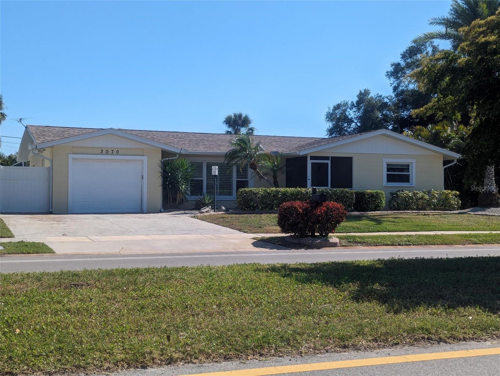 FURNISHED – HEATED POOL – PET-FRIENDLY GULF GATE HOME. Just 10 Minutes to Gorgeous Siesta Key Beach! This beautifully updated and impeccably clean pool home offers the perfect Florida retreat. Featuring a bright and cheerful kitchen with granite countertops, the home is fully furnished for comfort and convenience. The primary suite includes a king-size bed and a walk-in shower, while the guest room has a queen bed, and there’s an additional sofa sleeper for extra guests. Enjoy a separate dining room and a spacious Florida room, with a wall of sliding glass doors that provide stunning views of the heated pool and fenced yard. TVs in every room ensure entertainment for all. The guest bathroom includes a luxurious jetted tub for relaxation. Pet-friendly with pet fee. Don’t miss this fantastic opportunity to live just minutes from Siesta Key Beach!