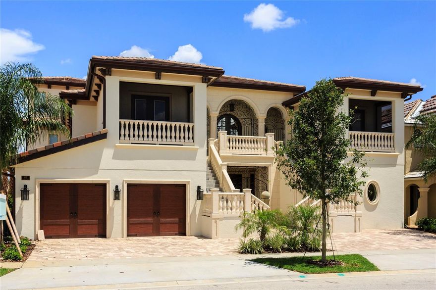 Welcome to the Golden Bear Mansion, an extraordinary 10-bedroom custom estate situated on an oversized double lot in the renowned golf community of Reunion Resort this one-of-a-kind residence offers an unmatched collection of luxury amenities rarely found in a private home. The striking front façade immediately sets the tone, highlighted by dramatic dual travertine staircases that lead to a fully covered balcony with retractable screens—perfect for enjoying the Florida lifestyle year-round. Inside, regal entry doors with Oni signature hands-free automatic operation welcome you into the grand atrium and the first of several spectacular entertaining spaces. This area features a full chef’s kitchen with high-end commercial appliances, custom quartz countertops, marble-inlaid flooring, and a card lounge with multiple televisions. Beyond the main entertaining area, a custom vestibule leads to several remarkable spaces including a private 12-seat movie theater, the main entertainment living room, a two-lane bowling alley, and access to the fully finished lower level. The finished basement offers an incredible collection of wellness and recreation amenities, including a private massage room, a full indoor basketball court with a retractable hoop that converts the space into a squash court, locker facilities with his-and-hers showers, a sauna, and a steam room. The wellness experience continues with an indoor spa featuring a hot tub and heated lounge chairs, as well as a fully equipped private fitness center. On the second level, the formal living room flows seamlessly into a stunning custom kitchen anchored by a massive single-slab quartz island. A grand hallway showcases tray ceilings, marble inlaid floors, dramatic chandeliers, and elegant architectural details throughout. This floor also hosts beautifully designed guest suites, each uniquely styled with tray ceilings, private en-suite bathrooms, custom showers, and thoughtful luxury touches such as heated towel racks. The third level functions perfectly as a private multi-generational suite, complete with its own kitchen, living room, and two expansive primary suites. Each suite features spa-inspired bathrooms, including one with a steam shower and another with a Jacuzzi tub with a hidden television. Outside, the resort-style pool area overlooks the renowned Jack Nicklaus Signature Golf Course at Reunion Resort and is designed for ultimate relaxation and entertainment. Enjoy an oversized pool with a waterslide and built-in spa, travertine decking, a custom swim-up bar, and a pavilion with retractable screens and a fire pit—perfect for entertaining in style. This exceptional estate offers far more than words can capture. Experience the Golden Bear Mansion in person and discover one of the most remarkable luxury homes in Central Florida.