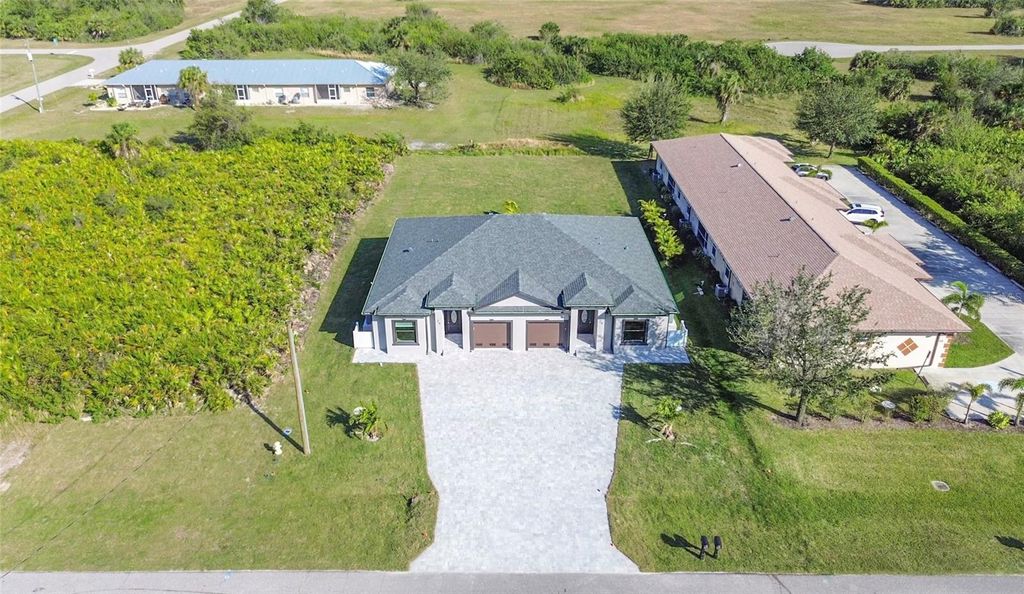 Photo of 24 Donlon Drive, Rotonda West, FL 33947 (MLS # C7516173)