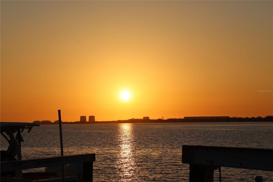 ***MARKET ADJUSTMENT*** MOTIVATED SELLER!!!  A true BOATERS PARADISE!!!  Don't miss out on this beautiful, custom waterfront home perched on the Manatee River with captivating sunsets and expansive water views!  The home offers unrivaled waterfront luxury and seamless indoor-outdoor living.  The generous-sized modern pool (6' deep with sun shelf, waterfall, 2 fire bowls), 6-person spa, oversized sun deck and outdoor kitchen (equipped with grill, beverage refrigerator, ice maker, sink, & storage) is ready to host all the family parties.  The dock includes LED lighting, potable water, electrical outlets, and 2 lifts, one 20k for your boat and one 10k platform lift for dual personal watercraft.

This stunning home offers 5 generously sized bedrooms with STORAGE GALORE, 4 full and 1 half bath, 3 living / entertainment areas, a dream kitchen with breakfast bar and expansive island, formal dining room, separate office, and oversized 3-car garage (additional 10' in depth and 9' doors) and driveway for ample storage and parking.  The primary bedroom is an owner's retreat, with dry bar, 2 walk-in closets with custom shelving and 2 additional built-in closets for abundant storage and organization.  The primary bathroom offers maximum relaxation with its generously sized free-standing tub and a shower with 3 shower heads and a Moen Spa system with 4 body jets.  This home includes allocated space for a residential elevator.

The Reserve at Harbour Walk community is a boater's paradise with direct access to the Gulf of America and Tampa Bay.  The neighborhood amenities include a kayak launch/storage, tennis courts, and a playground.  The community is also in close proximity to I-75, UTC Mall, diverse restaurants, shopping pristine beaches, and 3 major airports.