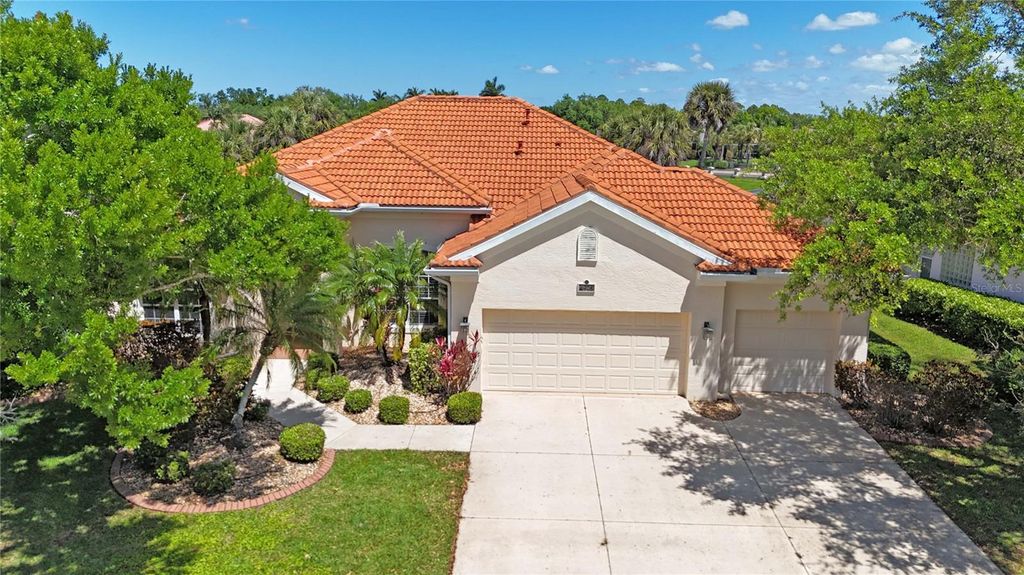 Photo of 4975 Sabal Lake Circle, Sarasota, FL 34238 (MLS # A4687548)