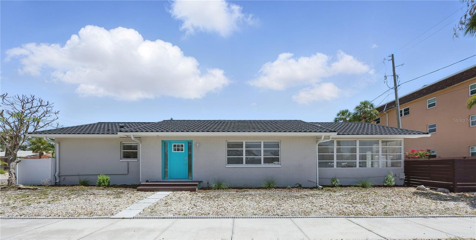Beachside Bliss Awaits in St. Pete Beach!
Just 100 steps from the sugar-white sands of St. Pete Beach, this fully renovated 2-bedroom, 2-bath mid-century coastal home brings together retro charm and modern comfort. Enjoy deeded beach access and an unbeatable location close to everything that makes beach living easy and fun.
Inside, you’ll find nearly 1,500 sq. ft. of bright, open living space with stylish updates throughout. The modern kitchen features new appliances, a touchless faucet, and a sit-up breakfast bar—perfect for casual dining or morning coffee before hitting the beach. The spacious sunroom opens to a private patio ideal for relaxing, entertaining, or rinsing off after a day in the sand with the outdoor shower and spa-style bathrooms.
Practical touches include a large indoor laundry room, brand new A/C ), a newer tile roof, and owned solar panels for energy efficiency.
Located on Casablanca Ave & Steps from the silky white sand, you’ll live like you are on vacation and love being able to walk or bike to local cafés, tiki bars, and the Don CeSar Hotel. Pass-a-Grille and nearby boat ramps are a quick bike ride away.  Conveniently located 15 minutes from Downtown St Pete where you can enjoy the local boutiques, great restaurants, breweries, art museums, and sports.  
This home offers the best of laid-back coastal living—a stylish retreat with every modern convenience.