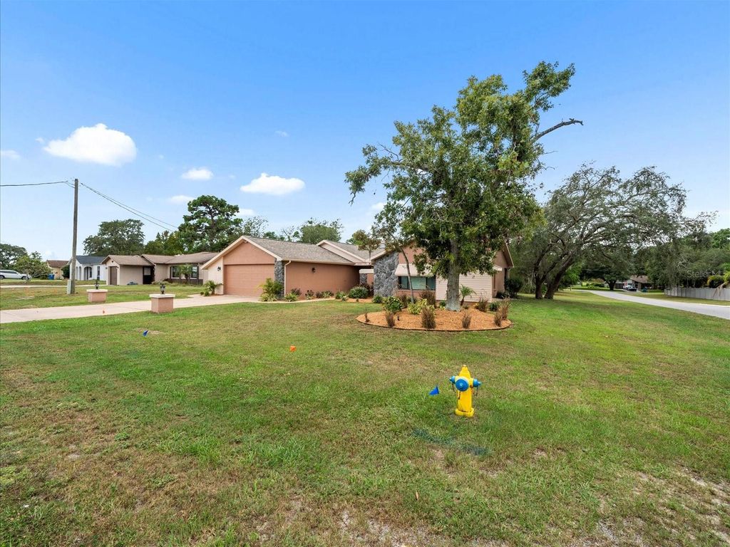 Photo of 2097 Whitewood Avenue, Spring Hill, FL 34609 (MLS # TB8432370)