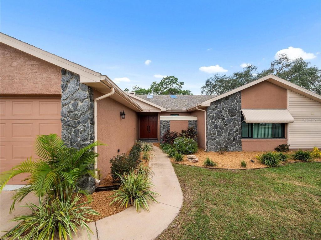 Photo of 2097 Whitewood Avenue, Spring Hill, FL 34609 (MLS # TB8432370)