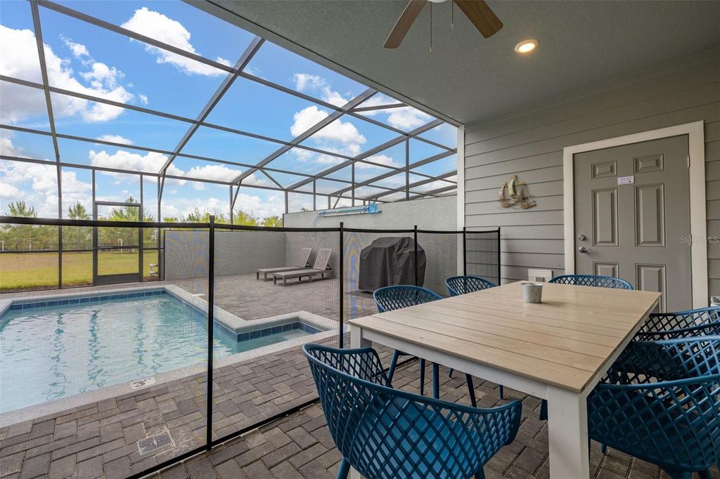 Photo of 971 Paradise Drive, Davenport, FL 33897 (MLS # S5126361)