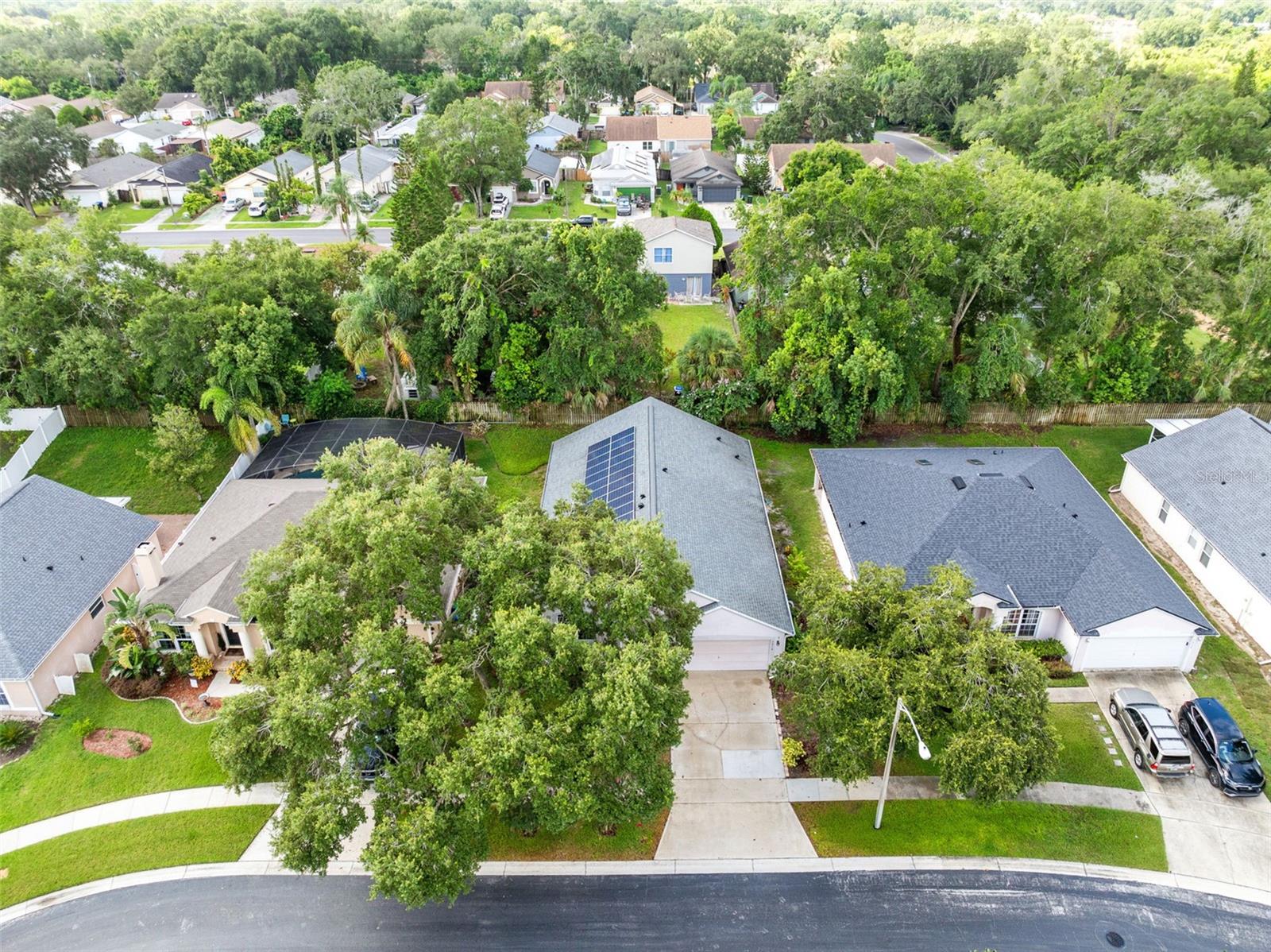Welcome to this lovely home in the gated community of Lakeside Reserve! This spacious residence offers 3 bedrooms, a versatile flex room, and 2 full bathrooms, thoughtfully designed with a split floorplan, vaulted ceilings, and abundant natural light. Energy-efficient solar panels (fully paid off) help reduce monthly electric bills, while recent updates bring peace of mind with a 2018 roof and HVAC system, plus a transferable termite bond. The kitchen is a true highlight with solid wood cabinetry, granite countertops, newer stainless steel appliances, and a convenient breakfast bar, all overlooking the open-concept family room—perfect for gatherings. Ideally located with easy access to Maitland, Altamonte Springs, and Longwood, this home combines comfort, style, and convenience in a desirable gated setting.