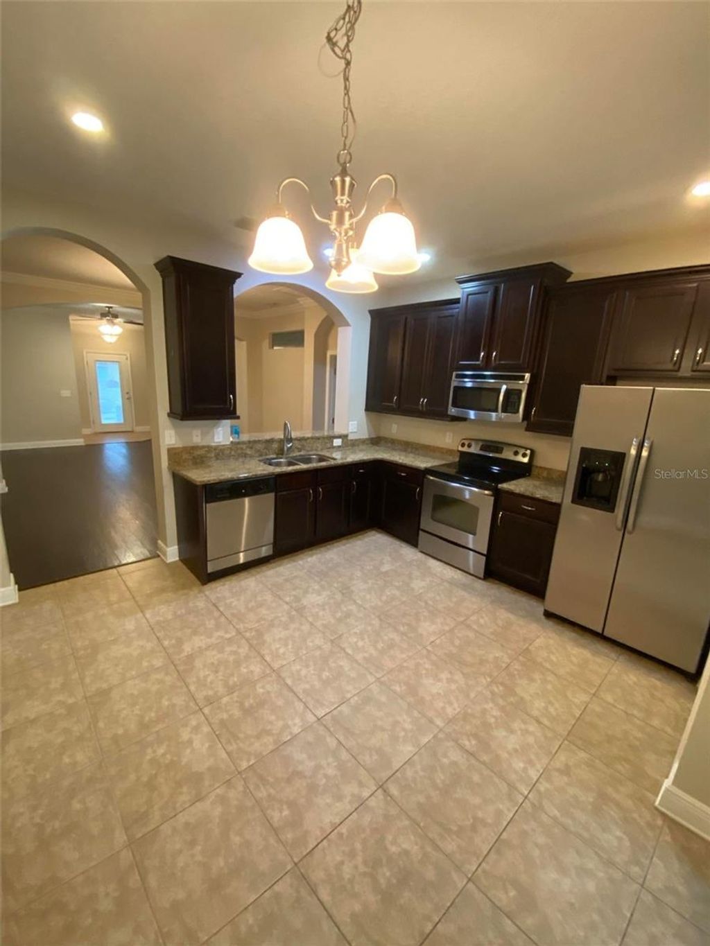 Photo of 6934 Frog Pocket Place, Tampa, FL 33616 (MLS # TB8471511)