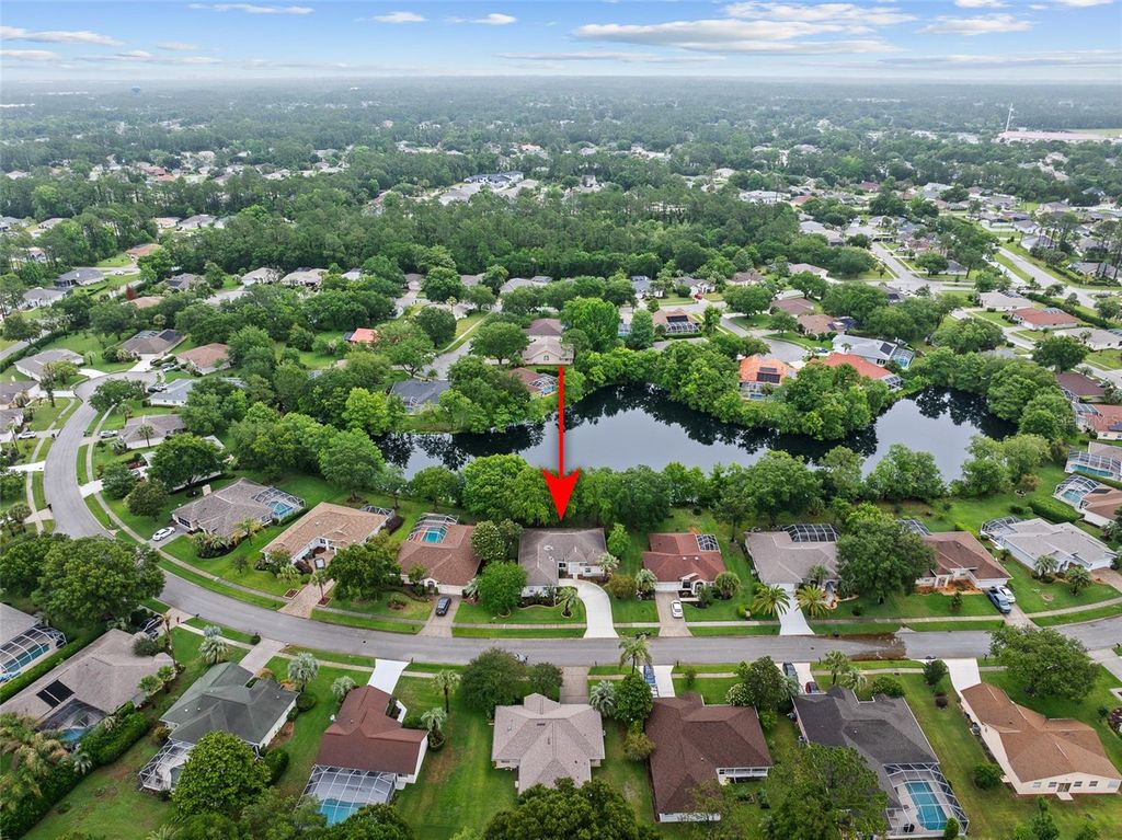 Photo of 28 Cedar Point Drive, Palm Coast, FL 32164 (MLS # V4949000)