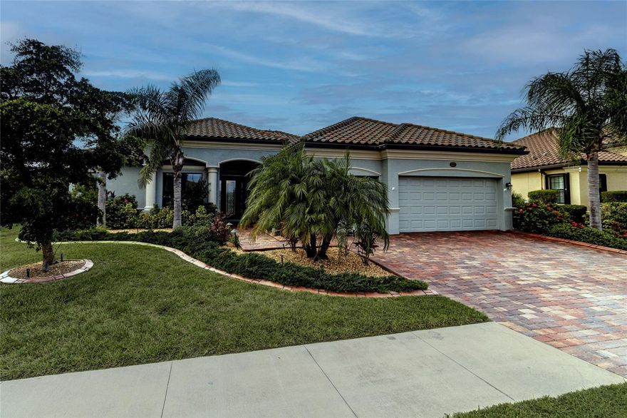 This beautiful pool home is located in the sought after gated community of Gran Paradiso.  This 3 bedroom + 1 flex room that can be a 4th bedroom, office, or even game room/craft room, 2.5 bath home 2,365 square feet of living space, also it has a 3 car garage.  The ensuite bath includes a double vanity, soaking tub, walk-in shower, linen closet, and spacious walk-in closet. The private screened lanai is the perfect spot to unwind and watch the beautiful sunsets, swim in your private pool, or soak in your private spa.  Gran Paradiso is a Tuscan-inspired, resort style community. Gran Paradiso offers amenities that include a full-time activity director, zero-entry pool, tennis and pickleball courts, basketball, sauna, hot tub, playground, clubhouse, walking trails.  Even a Gopher tortoise conservation area! 

Located just minutes from the popular Wellen Park, the Atlanta Braves Stadium, Gulf beaches, shopping, and restaurants, this home is the ideal combination of comfort, luxury, and lifestyle. The community also has lakes and nature preserves and it's only about 10 minutes from Interstate 75.