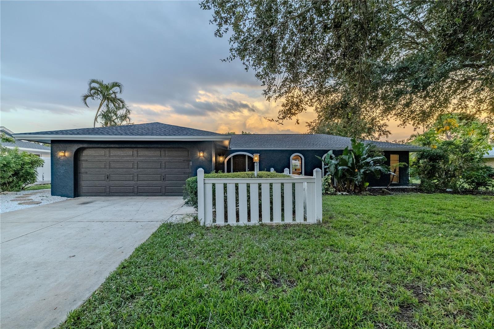 Exceptional Palma Sola Bradenton home just steps from Riverview Boulevard and the Manatee River! Discover the charm of this meticulously maintained property, ideally situated in a sought-after NO FLOOD ZONE, offering peace of mind with NO DAMAGE from last year’s storms. This home can also be rented short-term with zero restrictions and no HOA. The possibilities are endless! Let your vacation home pay for itself! This stunning property, cherished by its original family owners, has been thoughtfully updated and is ready for you to move in! Key Features Include; brand new roof replaced in 2024, a newly renovated kitchen with state-of-the-art stainless-steel appliances, luxurious quartz countertops, and a captivating backsplash with a marine theme to fit the bright space that connects to a eat-in breakfast / dining room. The pull-up kitchen bar opens to the living area making the space ideal for entertaining. This 3 bed / 2 bath home has a spacious split floor plan ideal for privacy and tranquility and perfect for family living. The living area opens to the screened-in lanai that overlooks an outdoor oasis with a generous, private fenced yard that is ideal for a future pool installation and more outdoor fun. A concrete pad is also available for RV or boat parking. Other recent updates include a new HVAC system (2024), hurricane-rated garage door and irrigation system. Nestled in the coveted Palma Sola neighborhood this home is conveniently located near DeSoto National Park and Robinson Preserve. Enjoy easy access to grocery stores, gas stations, delightful restaurants, and retail shopping. This home is also a boater’s paradise with the Warner’s Bayou boat ramp just around the corner! Don’t miss out on this incredible opportunity to call this beautiful house your home!