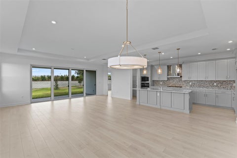 Tiny photo for 557 Hammock Oaks Boulevard, Lady Lake, FL 32159 (MLS # W7890757)