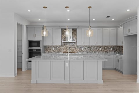 Tiny photo for 557 Hammock Oaks Boulevard, Lady Lake, FL 32159 (MLS # W7890757)