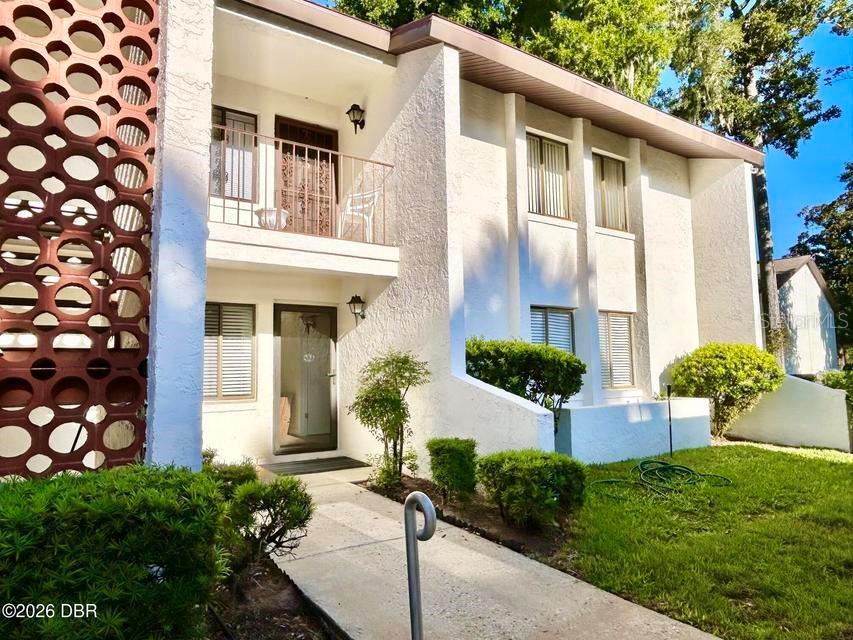 Photo of 1 Tomoka Oaks Boulevard #119, Ormond Beach, FL 32174 (MLS # V4951555)