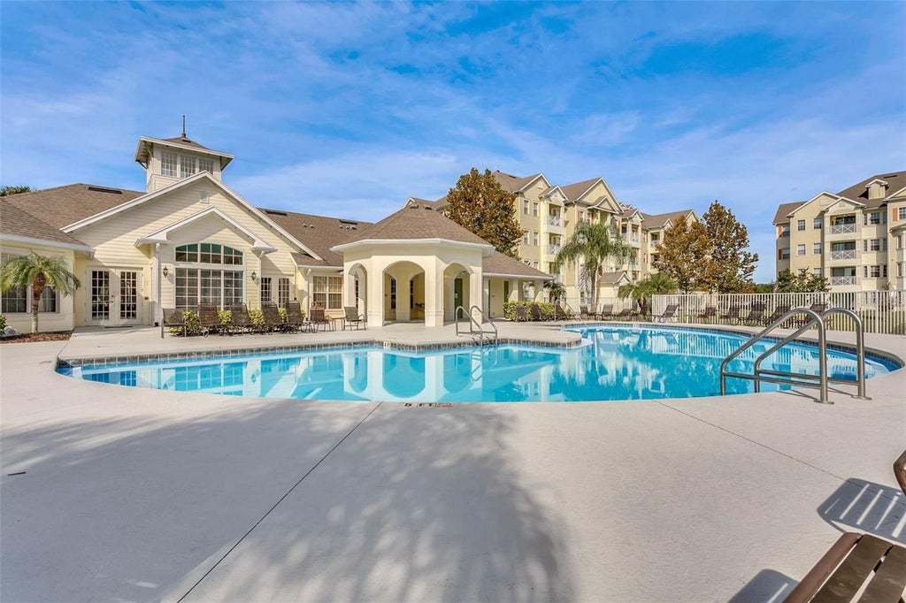 Photo of 5252 Cane Island Loop #204, Kissimmee, FL 34746 (MLS # O6428701)