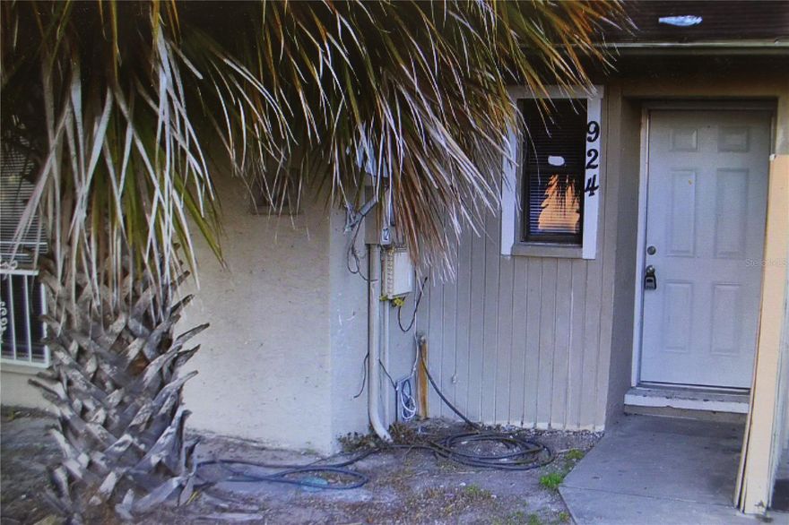 INVESTMENT OPPORTUNITY. TWO BEDROOMS 1 BATH CLOSE TO USF AND BUSCH GARDENS. HOME IS LEASED THROUGH SEPTEMBER 30, 2026 ESTABLISHED TENANT - INCOME PRODUCING UNIT.  GREAT ROOM PLAN, KITCHEN FAMILY ROOM COMBO, WOOD BURNING FIREPLACE ASSIGNED PARKING