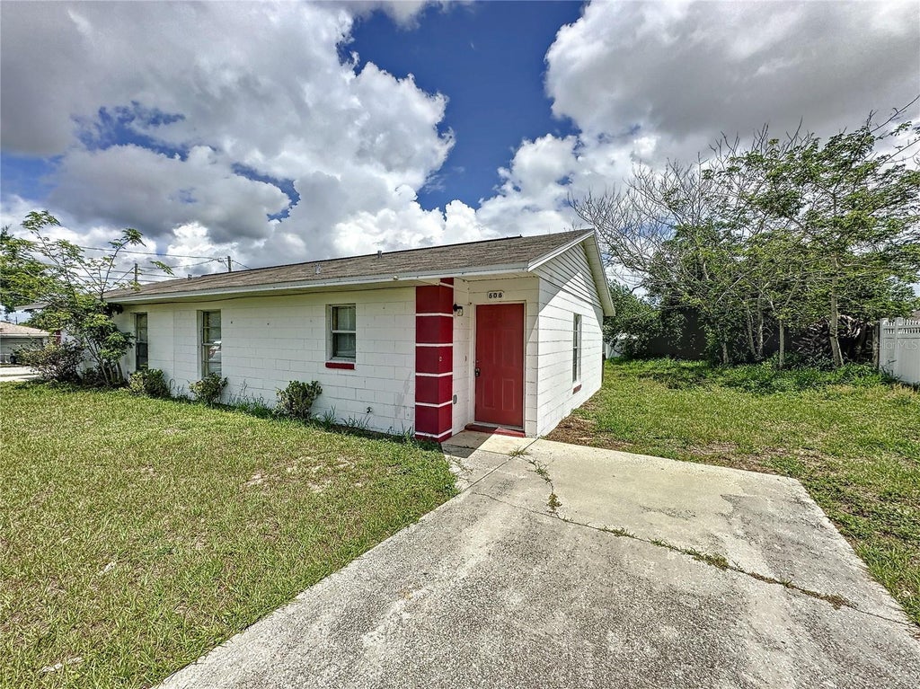 Photo of 606 Claude Holmes Sr Avenue, Haines City, FL 33844 (MLS # S5156837)