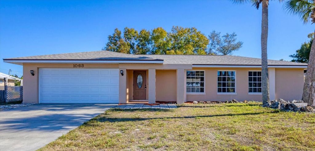 Photo of 1063 Robat Terrace NW, Port Charlotte, FL 33948 (MLS # D6145449)