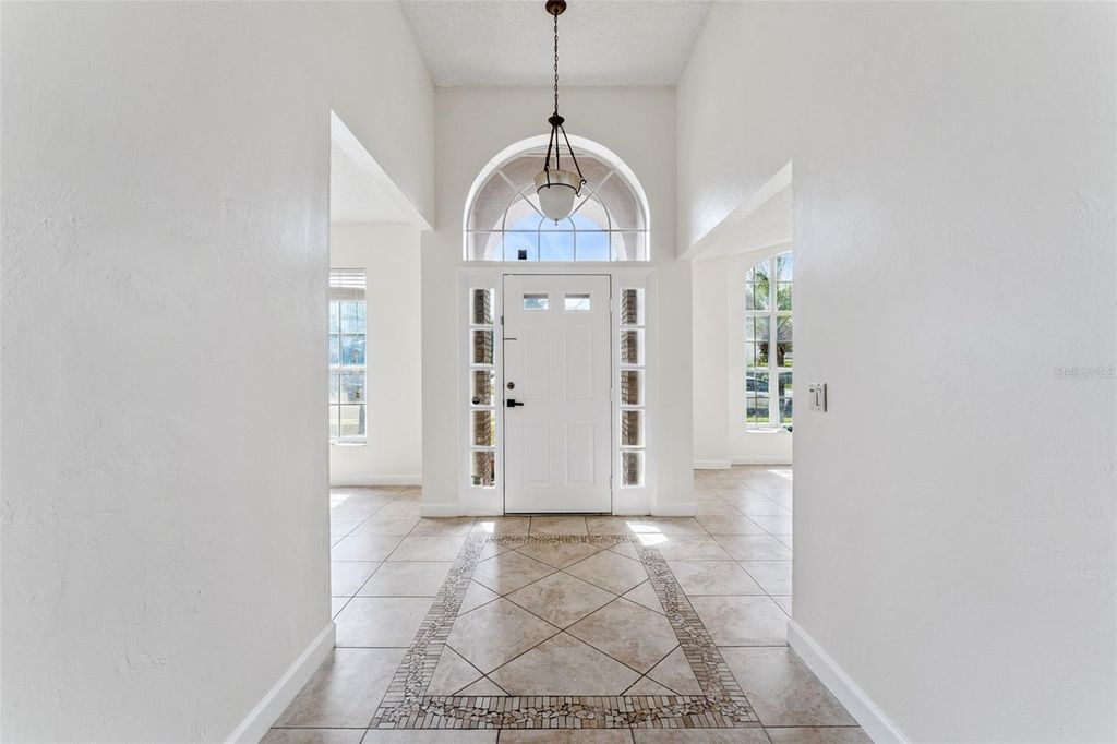 Photo of 12879 Lower River Boulevard, Orlando, FL 32828 (MLS # O6406780)