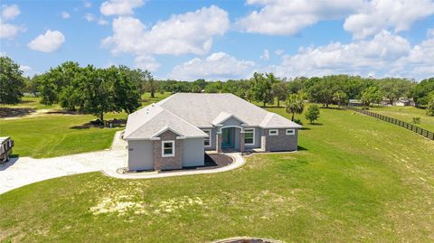 Photo of 5489 Nantahala Lane, Lady Lake, FL 32159 (MLS # OM700573)