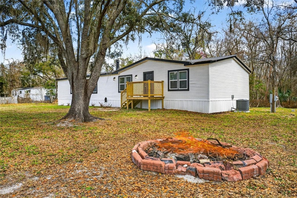 Photo of 6126 Tulip Drive, Wesley Chapel, FL 33544 (MLS # TB8561315)