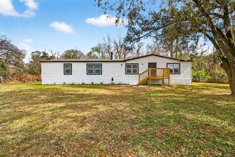 Photo of 6126 Tulip Drive, Wesley Chapel, FL 33544 (MLS # TB8561315)