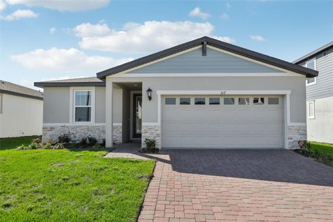 Photo of 317 Castle Drive, Lake Alfred, FL 33850 (MLS # O6289912)