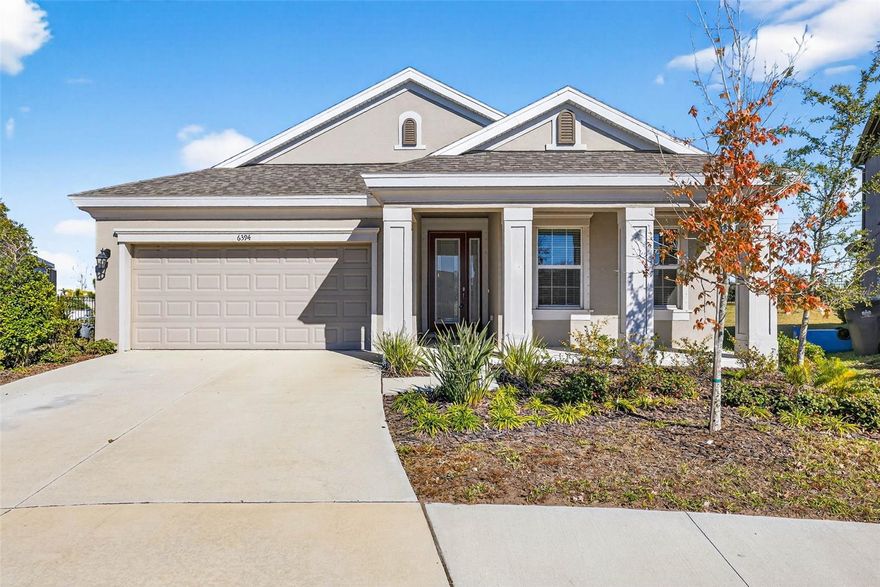 One or more photo(s) has been virtually staged. Skip the wait for new construction! This impeccably maintained 2023 "Sandpiper" by Homes by West Bay is move-in ready, offering the rare opportunity to own a nearly-new masterpiece without the builder’s timeline. Featuring 3 bedrooms and 3 full bathrooms, plus office and two-car garage across 2,101 sq. ft. of luxury living space, this home is tucked away at the end of a quiet cul-de-sac on a massive 0.31-acre lot, nearly double the size of standard homesites in the area. You are greeted by a charming covered front porch and an inviting, elegant entry that draws you past a dedicated home office with elegant glass French doors and into a sophisticated, open-concept floor plan. High-end finishes throughout elevate the living experience, specifically in the gourmet chef’s kitchen, a showstopper highlighted by sleek quartz countertops, subway tile, a natural gas stove, built-in wall oven and microwave, and a massive center island that overlooks both the spacious dining area and the expansive great room. Oversized pocket glass sliders create an effortless indoor-outdoor transition to the covered back porch, overlooking a sprawling, private backyard that serves as a blank canvas for your dream pool and outdoor entertainment oasis.

Positioned at the rear of the home for maximum privacy, the primary retreat is a true Sanctuary, featuring dual walk-in closets and a spa-inspired ensuite complete with dual split vanities, a private water closet, a dedicated linen closet, and a large walk-in shower with luxury tile finishes. The home’s thoughtful three-way split floor plan ensures ultimate peace for guests and family: one additional bedroom features its own private ensuite with a walk-in shower, while the third bedroom has easy access to a full third bathroom featuring a tub. For added modern efficiency, the home is equipped with a tankless water heater.

Just a short stroll away, enjoy the award-winning amenities of Waterset, including three resort-style pools, a fitness center, splash pads, and miles of trails. Sports enthusiasts will love the proximity to premier local golf courses and the SouthShore Sportsplex, featuring world-class turf fields and community programming. Perfectly positioned for a quick commute to Downtown Tampa, MacDill AFB, and the award-winning Florida beaches, this is more than a home, it’s a destination. Schedule your private tour today!