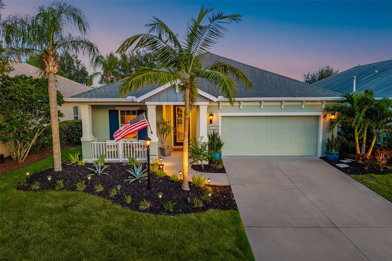 Welcome to 12153 Forest Park Circle—an exceptional home in the heart of the gated Central Park community in Lakewood Ranch. Designed with intention and customized by a skilled craftsman, this residence is anything but ordinary—from the moment you arrive, you'll feel the difference. This thoughtfully designed 3-bedroom, 2-bath home with a den showcases high-end craftsmanship, smart functionality, and timeless style. Every detail has been carefully curated, from the solid wood cabinetry with soft-close doors and drawers to the granite and quartzite countertops, Bosch kitchen appliances, and custom closet systems throughout. The primary suite offers a spa-like experience with a luxurious zero-entry shower, while the garage features an epoxy floor. Smart home enhancements include LED lighting, a central smart hub, Lutron lighting controls, an Ecobee thermostat, and an intelligent irrigation system—designed for comfort, efficiency, and ease. The exterior was finished with Sherwin Williams Rain Refresh self-cleaning paint, and professionally designed landscaping includes hardwired lighting for standout curb appeal.
Step into your own private backyard oasis featuring a custom paver fire pit and outdoor entertaining space—perfect for relaxing evenings under the stars.
Central Park is more than a neighborhood—it’s a lifestyle. Residents enjoy two dog parks, a splash pad, playground, sports fields, pickleball and tennis courts, a concession stand, picnic pavilion, and year-round community events—all within a secure and welcoming gated setting. Located within an A+ school district and just minutes from top-rated beaches, UTC shopping, downtown Sarasota, and major airports, this home offers luxury, convenience, and community all in one.